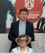 29 April 2016; Pictured at the launch of Sports Surgery Clinic’s pilot study to assess the effects of rehabilitation post concussion in adolescent rugby players and the development of a Concussion Passport screening service is Colm Fuller, lead musculoskeletal physiotherapist at Sports Surgery Clinic, with Liam Turner, Blackrock College Senior Cup team. Sports Surgery Clinic, Santry Demesne, Dublin 9.  Picture credit: Piaras Ó Mídheach / SPORTSFILE