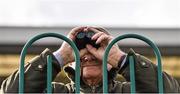 28 April 2016; A punter uses binoculars during the races. Punchestown, Co. Kildare.  Picture credit: Cody Glenn / SPORTSFILE