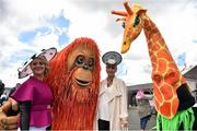 29 April 2016; Paula Clancy, left, from Inverin, Co. Galway, and Edel Black, from Galway City, with some colourful characters ahead of the races. Punchestown, Co. Kildare. Picture credit: Cody Glenn / SPORTSFILE