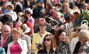 29 April 2016; Attendees look on during the best dressed lady competition. Punchestown, Co. Kildare. Picture credit: Cody Glenn / SPORTSFILE