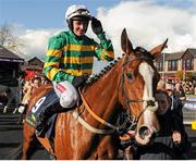 29 April 2016; Jockey Barry Geraghty salutes the crowd as he is led into the winner's enclosure after winning the Tattersalls Ireland Champion Novice Hurdle on Jer's Girl. Punchestown, Co. Kildare. Picture credit: Seb Daly / SPORTSFILE
