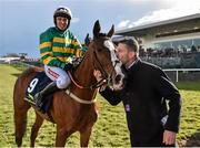 29 April 2016; Trainer Gavin Cromwell kisses Jer's Girl with Barry Geraghty after winning the Tattersalls Ireland Champion Novice Hurdle. Punchestown, Co. Kildare. Picture credit: Cody Glenn / SPORTSFILE