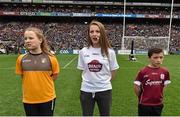24 April 2016; Áine Gray, centre, Co. Kildare, reading a line of the Proclamation during the Laochra entertainment performance after the Allianz Football League Final. Allianz Football League Finals, Croke Park, Dublin.  Picture credit: Brendan Moran / SPORTSFILE