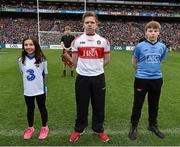 24 April 2016; Jack Gunning, centre, Co. Derry, reading a line of the Proclamation during the Laochra entertainment performance after the Allianz Football League Final. Allianz Football League Finals, Croke Park, Dublin.  Picture credit: Brendan Moran / SPORTSFILE