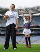 18 May 2010; 6 year old Elva Maguire, from Templeogue, Co. Dublin, with Down footballer Ambrose Rogers at the Vhi GAA Cúl Camps Ambassador Launch 2010. The Vhi GAA Cúl Camps are the largest children’s summer activity in the country with over 85,000 children taking part in over 1,000 camps around Ireland and overseas. Croke Park, Dublin. Photo by Sportsfile