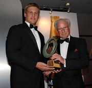 20 May 2010; Chris Henry, winner of the Ulster Rugby Supporters Club Outstanding Player of the Season award, presented by Dr Jack Kyle, President of the URSC. Ulster Rugby Awards, La Mon Hotel, Belfast. Picture credit: John Dickson / SPORTSFILE
