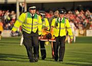 21 May 2010; Gareth Coughlan, St Patrick's Athletic, is stretchered off the pitch by medical staff after a tackle with Mark Quigley, Bohemians. Airtricity League Premier Division, St Patrick's Athletic v Bohemians, Richmond Park, Inchicore, Dublin. Picture credit: Barry Cregg / SPORTSFILE