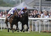 22 May 2010; Samuel Morse, with Johnny Murtagh up, right, leads Purple Glow with Kevin Manning up, on their way to winning the P Waters E.B.F. Marble Hill Stakes. The Curragh Racecourse, Co. Kildare. Picture credit: Barry Cronin / SPORTSFILE