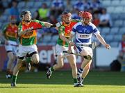 22 May 2010; Joe Fitzpatrick, Laois, in action against Derek Byrne, left, and Andrew Gaule, Carlow. Leinster GAA Hurling Senior Championship, Carlow v Laois, O'Moore Park, Portlaoise. Picture credit: Stephen McCarthy / SPORTSFILE