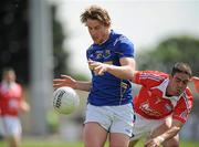 23 May 2010; Paddy Dowd, Longford, in action against John O'Brien, Louth. Leinster GAA Football Senior Championship Preliminary Round, Louth v Longford, O'Moore Park, Portlaoise, Co. Laois. Picture credit: Brian Lawless / SPORTSFILE