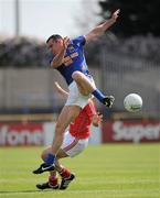 23 May 2010; Paul Barden, Longford, in action against Dessie Finnegan, Louth. Leinster GAA Football Senior Championship Preliminary Round, Louth v Longford, O'Moore Park, Portlaoise, Co. Laois. Picture credit: Brian Lawless / SPORTSFILE