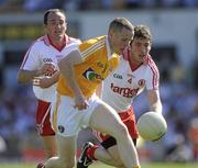 23 May 2010; Paddy Cunningham, Antrim, in action against Dermot Carlin, Tyrone. Ulster GAA Football Senior Championship Quarter-Final, Antrim v Tyrone, Casement Park, Belfast, Co. Antrim. Picture credit: Oliver McVeigh / SPORTSFILE