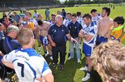 23 May 2010; Waterford manager John Owens speaks to his players after the game. Munster GAA Football Senior Championship Quarter-Final, Waterford v Clare, Fraher Field, Dungarvan, Co. Waterford. Picture credit: Diarmuid Greene / SPORTSFILE
