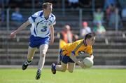 23 May 2010; Martin McMahon, Clare, in action against Maurice O'Gorman, Waterford. Munster GAA Football Senior Championship Quarter-Final, Waterford v Clare, Fraher Field, Dungarvan, Co. Waterford. Picture credit: Diarmuid Greene / SPORTSFILE