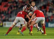 29 April 2016; Ross Ford, Edinburgh, is tackled by Tommy O'Donnell, left and Niall Scannell, right, Munster. Guinness PRO12 Round 21, Munster v Edinburgh. Irish Independent Park, Cork. Eóin Noonan / SPORTSFILE