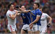 24 April 2016; Cathal McCarron, Tyrone, gets involved in a tusle with Feargal Flanagan, centre, and Eugene Keating, Cavan. Allianz Football League Division 2 Final, Tyrone v Cavan. Croke Park, Dublin.  Picture credit: Brendan Moran / SPORTSFILE