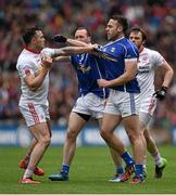 24 April 2016; Cathal McCarron, Tyrone, gets involved in a tusle with Feargal Flanagan, centre, and Eugene Keating, Cavan. Allianz Football League Division 2 Final, Tyrone v Cavan. Croke Park, Dublin.  Picture credit: Brendan Moran / SPORTSFILE