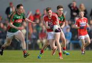 30 April 2016; Ronan O'Toole, Cork, in action against Stephen Coen, left, and Fergal Boland, Mayo. EirGrid GAA Football Under 21 All-Ireland Championship Final, Cork v Mayo. Cusack Park, Ennis, Co. Clare. Picture credit: Piaras Ó Mídheach / SPORTSFILE