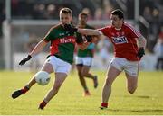 30 April 2016; Michael Plunkett, Mayo, in action against Michael McSweeney, Cork. EirGrid GAA Football Under 21 All-Ireland Championship Final, Cork v Mayo, Cusack Park, Ennis, Co. Clare. Picture credit: Seb Daly / SPORTSFILE