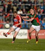 30 April 2016; Seán White, Cork, in action against James Kelly, Mayo. EirGrid GAA Football Under 21 All-Ireland Championship Final, Cork v Mayo. Cusack Park, Ennis, Co. Clare. Picture credit: Piaras Ó Mídheach / SPORTSFILE