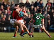 30 April 2016; Peter Kelleher, Cork, in action against Séamus Cunniffe, left, and Michael Hall, Mayo. EirGrid GAA Football Under 21 All-Ireland Championship Final, Cork v Mayo. Cusack Park, Ennis, Co. Clare. Picture credit: Piaras Ó Mídheach / SPORTSFILE