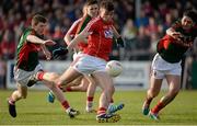 30 April 2016; Peter Kelleher, Cork, takes a shot at goal as he is closed down by Eoin O’Donoghue, left, and Seamus Cunniffe, right, Mayo. EirGrid GAA Football Under 21 All-Ireland Championship Final, Cork v Mayo, Cusack Park, Ennis, Co. Clare. Picture credit: Seb Daly / SPORTSFILE
