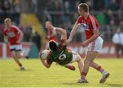30 April 2016; Stephen Coen, Mayo, is fouled by Sean White, who is subsequently shown a black card. EirGrid GAA Football Under 21 All-Ireland Championship Final, Cork v Mayo, Cusack Park, Ennis, Co. Clare. Picture credit: Seb Daly / SPORTSFILE