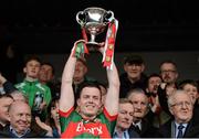 30 April 2016; Mayo captain Stephen Coen lifts the cup after the game. EirGrid GAA Football Under 21 All-Ireland Championship Final, Cork v Mayo. Cusack Park, Ennis, Co. Clare. Picture credit: Piaras Ó Mídheach / SPORTSFILE