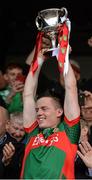 April 2016; Mayo captain Stephen Coen lifts the cup after the game. EirGrid GAA Football Under 21 All-Ireland Championship Final, Cork v Mayo. Cusack Park, Ennis, Co. Clare. Picture credit: Piaras Ó Mídheach / SPORTSFILE