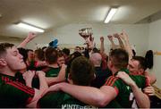 April 2016; Mayo players celebrate with the cup in the dressing room after the game. EirGrid GAA Football Under 21 All-Ireland Championship Final, Cork v Mayo. Cusack Park, Ennis, Co. Clare. Picture credit: Piaras Ó Mídheach / SPORTSFILE