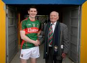 30 April 2016; Mayo's Conor Loftus celebrates with his grand uncle and former GAA President Dr. Mick Loftus after the game. EirGrid GAA Football Under 21 All-Ireland Championship Final, Cork v Mayo. Cusack Park, Ennis, Co. Clare. Picture credit: Piaras Ó Mídheach / SPORTSFILE