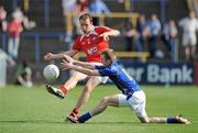 23 May 2010; Michael Fanning, Louth, in action against Declan Reilly, Longford. Leinster GAA Football Senior Championship Preliminary Round, Louth v Longford, O'Moore Park, Portlaoise, Co. Laois. Picture credit: Brian Lawless / SPORTSFILE