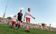 23 May 2010; Brian Dooher leads the Tyrone team on parade before the game. Ulster GAA Football Senior Championship Quarter-Final, Antrim v Tyrone, Casement Park, Belfast, Co. Antrim. Picture credit: Oliver McVeigh / SPORTSFILE