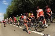 24 May 2010; A general view of the riders as they await the decision of UCI Commissaire President Jean-Pierre Coppenolle following an accident involving riders and a vehicle. The Commissaire eventually decided to neutralise the race with approxamatley 50Km to go. FBD Insurance Ras, Stage 2, Dundalk – Carrick-on-Shannon. Picture credit: Stephen McCarthy / SPORTSFILE