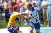 23 May 2010; Wayne Hennessy, Waterford, in action against Declan Callinan, Clare. Munster GAA Football Senior Championship Quarter-Final, Waterford v Clare, Fraher Field, Dungarvan, Co. Waterford. Picture credit: Diarmuid Greene / SPORTSFILE