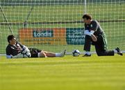 26 May 2010; Republic of Ireland's Keiren Westwood, left, relaxes with goalkeeping coach Alan Kelly during squad training ahead of their International Friendly against Algeria on Friday night. Gannon Park, Malahide, Dublin. Picture credit: Brian Lawless / SPORTSFILE