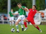 26 May 2010; Paddy Madden, Republic of Ireland, in action against Max Porter, England. International Challenge Trophy, Republic of Ireland v England, RSC, Waterford. Picture credit: David Maher / SPORTSFILE