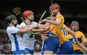 1 May 2016; Darach Honan, Clare, and Jamie Barron and Tadhg de Búrca, Waterford, in a tussle during the game. Allianz Hurling League Division 1 Final, Clare v Waterford. Semple Stadium, Thurles, Co. Tipperary. Picture credit: Piaras Ó Mídheach / SPORTSFILE