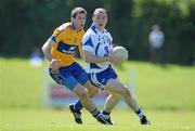 23 May 2010; Shane Briggs, Waterford, in action against Gary Brennan, Clare. Munster GAA Football Senior Championship Quarter-Final, Waterford v Clare, Fraher Field, Dungarvan, Co. Waterford. Picture credit: Diarmuid Greene / SPORTSFILE