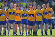 23 May 2010; The Clare team stand together during the playing of the National Anthem. Munster GAA Football Senior Championship Quarter-Final, Waterford v Clare, Fraher Field, Dungarvan, Co. Waterford. Picture credit: Diarmuid Greene / SPORTSFILE