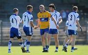 23 May 2010; Ger Quinlan, Clare, exchanges hand-shakes with Waterford players after the game. Munster GAA Football Senior Championship Quarter-Final, Waterford v Clare, Fraher Field, Dungarvan, Co. Waterford. Picture credit: Diarmuid Greene / SPORTSFILE