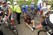 27 May 2010; Lars Pria, Team Arbö KTM Gebruder Weiss, lies injured after a crash inside the opening 20km. FBD Insurance Ras, Stage 5, Tipperary - Seskin Hill. Picture credit: Stephen McCarthy / SPORTSFILE