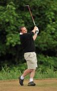 28 May 2010; Waterford hurling manager Davy Fitzgerald, from Sixmilebridge GAA Club, watches his drive from the 14th tee. FBD All-Ireland GAA Golf Challenge 2010 - Munster Final, Dromoland Castle Golf and Country Club, Newmarket-On-Fergus, Co. Clare. Picture credit: Diarmuid Greene / SPORTSFILE