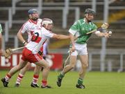 29 May 2010; Colm Forde, London, in action against Oisin McCloskey, Derry. Ulster GAA Hurling Senior Championship Quarter-Final, Derry v London, Casement Park, Belfast. Picture credit: Oliver McVeigh / SPORTSFILE