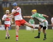 29 May 2010; Ruairi Convery, Derry, in action against Matt Fitzsimmons, London. Ulster GAA Hurling Senior Championship Quarter-Final, Derry v London, Casement Park, Belfast. Picture credit: Oliver McVeigh / SPORTSFILE