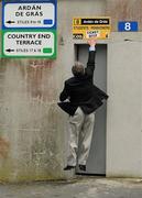 29 May 2010; The Kilkenny County Board Treasurer, Barry Hickey, jumps to place a 'Ticket Only' notice above the turnstile entrances in advance of the game. Leinster GAA Hurling Senior Championship, Galway v Wexford, Nowlan Park, Kilkenny. Picture credit: Ray McManus / SPORTSFILE