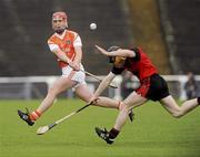 29 May 2010; John Corvan, Armagh, in action against Paddy Hughes, Down. Ulster GAA Hurling Senior Championship Quarter-Final, Down v Armagh, Casement Park, Belfast. Picture credit: Oliver McVeigh / SPORTSFILE