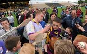 29 May 2010; Galway's Joe Canning signs autographs after the game. Leinster GAA Hurling Senior Championship, Galway v Wexford, Nowlan Park, Kilkenny. Picture credit: Ray McManus / SPORTSFILE