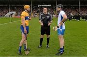 1 May 2016; Referee Brian Gavin performs the pre-match coin toss with team captains Cian Dillon, Clare, left, and Kevin Moran, Waterford. Allianz Hurling League Division 1 Final, Clare v Waterford. Semple Stadium, Thurles, Co. Tipperary. Picture credit: Piaras Ó Mídheach / SPORTSFILE