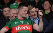 30 April 2016; Mayo captain Stephen Coen and An Taoiseach Enda Kenny T.D gesture towards supporters before the cup presentation. EirGrid GAA Football Under 21 All-Ireland Championship Final, Cork v Mayo. Cusack Park, Ennis, Co. Clare. Picture credit: Piaras Ó Mídheach / SPORTSFILE
